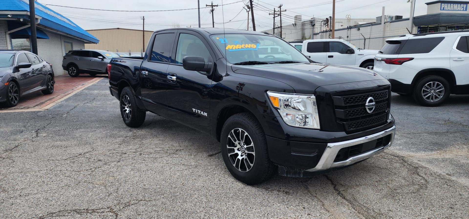 2021 Black Nissan Titan S Crew Cab 2WD (1N6AA1EEXMN) with an 5.6L V8 DOHC 32V engine, 9A transmission, located at 1842 Wirt Road, Houston, TX, 77055, (713) 973-3903, 29.805330, -95.484787 - Photo#1